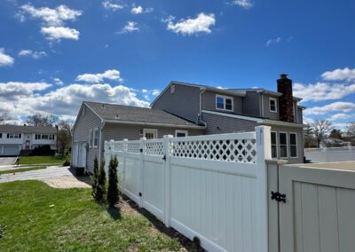 Vinyl fence by Fence Imperial, showcasing a sleek and modern design with low-maintenance features for a contemporary look.