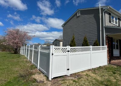 Classic wood fence installed by Fence Imperial, demonstrating elegant craftsmanship and natural beauty for enhancing property aesthetics