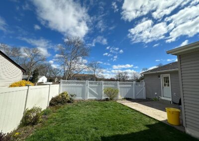 Vinyl fence by Fence Imperial, showcasing a sleek and modern design with low-maintenance features for a contemporary look.