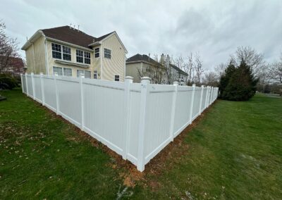 Vinyl fence by Fence Imperial, showcasing a sleek and modern design with low-maintenance features for a contemporary look.