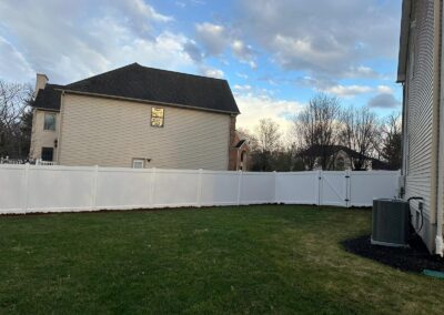 Vinyl fence by Fence Imperial, showcasing a sleek and modern design with low-maintenance features for a contemporary look.