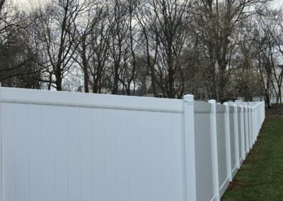 Vinyl fence by Fence Imperial, showcasing a sleek and modern design with low-maintenance features for a contemporary look.