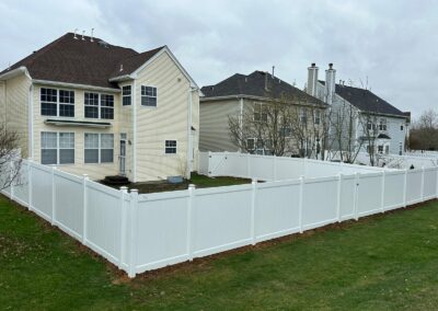 Vinyl fence by Fence Imperial, showcasing a sleek and modern design with low-maintenance features for a contemporary look.