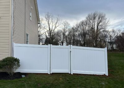 Vinyl fence by Fence Imperial, showcasing a sleek and modern design with low-maintenance features for a contemporary look.