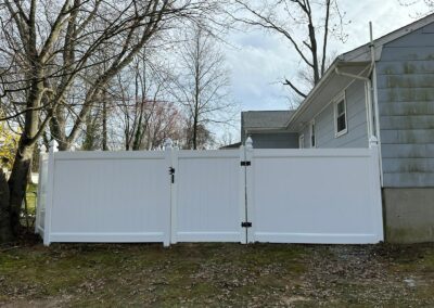 Vinyl fence by Fence Imperial, showcasing a sleek and modern design with low-maintenance features for a contemporary look.