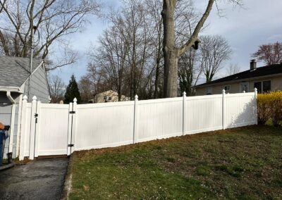 Vinyl fence by Fence Imperial, showcasing a sleek and modern design with low-maintenance features for a contemporary look.