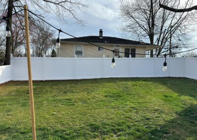 Vinyl fence by Fence Imperial, showcasing a sleek and modern design with low-maintenance features for a contemporary look.