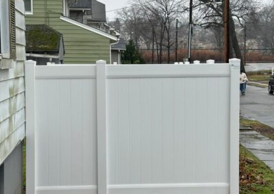 Vinyl fence by Fence Imperial, showcasing a sleek and modern design with low-maintenance features for a contemporary look.