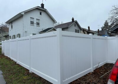 Vinyl fence by Fence Imperial, showcasing a sleek and modern design with low-maintenance features for a contemporary look.