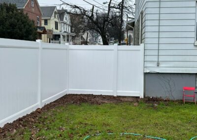 Vinyl fence by Fence Imperial, showcasing a sleek and modern design with low-maintenance features for a contemporary look.