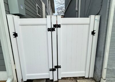 Vinyl fence by Fence Imperial, showcasing a sleek and modern design with low-maintenance features for a contemporary look.