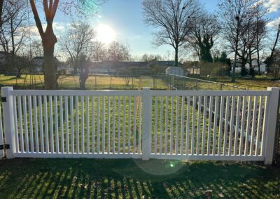 Vinyl fence by Fence Imperial, showcasing a sleek and modern design with low-maintenance features for a contemporary look.