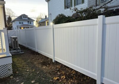 Vinyl fence by Fence Imperial, showcasing a sleek and modern design with low-maintenance features for a contemporary look.