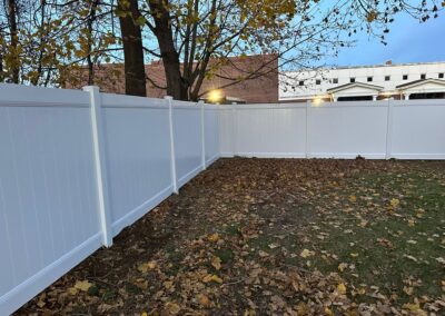 Vinyl fence by Fence Imperial, showcasing a sleek and modern design with low-maintenance features for a contemporary look.