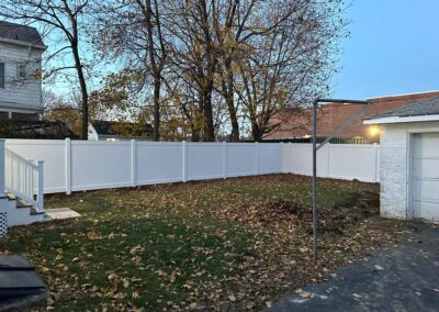 Vinyl fence by Fence Imperial, showcasing a sleek and modern design with low-maintenance features for a contemporary look.