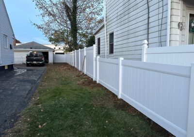 Vinyl fence by Fence Imperial, showcasing a sleek and modern design with low-maintenance features for a contemporary look.