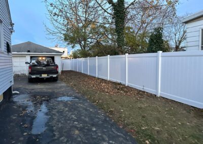 Vinyl fence by Fence Imperial, showcasing a sleek and modern design with low-maintenance features for a contemporary look.