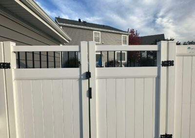 Vinyl fence by Fence Imperial, showcasing a sleek and modern design with low-maintenance features for a contemporary look.