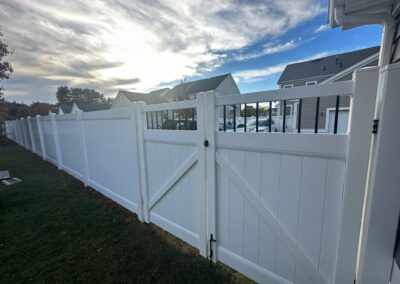 Vinyl fence by Fence Imperial, showcasing a sleek and modern design with low-maintenance features for a contemporary look.