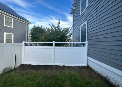 Vinyl fence by Fence Imperial, showcasing a sleek and modern design with low-maintenance features for a contemporary look.