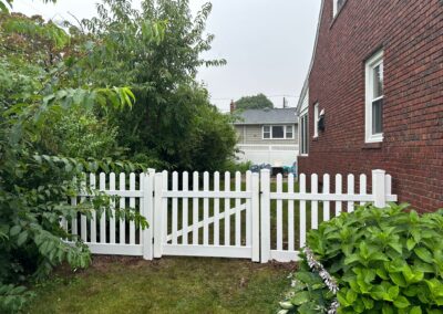 Vinyl fence by Fence Imperial, showcasing a sleek and modern design with low-maintenance features for a contemporary look.