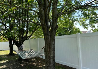 Vinyl fence by Fence Imperial, showcasing a sleek and modern design with low-maintenance features for a contemporary look.