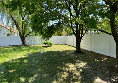 Vinyl fence by Fence Imperial, showcasing a sleek and modern design with low-maintenance features for a contemporary look.