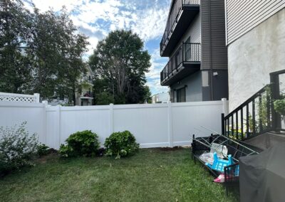 Vinyl fence by Fence Imperial, showcasing a sleek and modern design with low-maintenance features for a contemporary look.