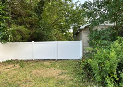 Vinyl fence by Fence Imperial, showcasing a sleek and modern design with low-maintenance features for a contemporary look.