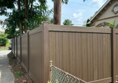 Vinyl fence by Fence Imperial, showcasing a sleek and modern design with low-maintenance features for a contemporary look.