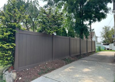 Vinyl fence by Fence Imperial, showcasing a sleek and modern design with low-maintenance features for a contemporary look.