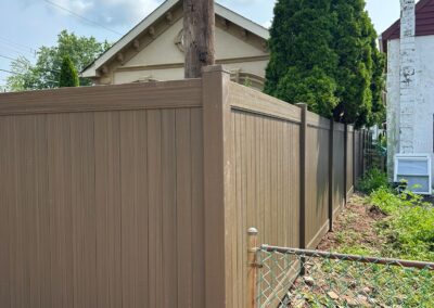 Vinyl fence by Fence Imperial, showcasing a sleek and modern design with low-maintenance features for a contemporary look.