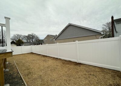 Vinyl fence by Fence Imperial, showcasing a sleek and modern design with low-maintenance features for a contemporary look.