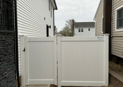 Vinyl fence by Fence Imperial, showcasing a sleek and modern design with low-maintenance features for a contemporary look.