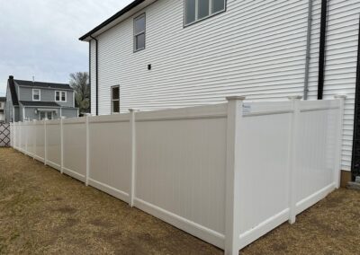 Vinyl fence by Fence Imperial, showcasing a sleek and modern design with low-maintenance features for a contemporary look.