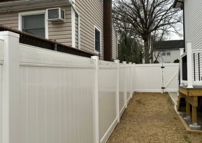 Vinyl fence by Fence Imperial, showcasing a sleek and modern design with low-maintenance features for a contemporary look.