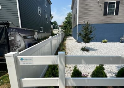 Vinyl fence by Fence Imperial, showcasing a sleek and modern design with low-maintenance features for a contemporary look.