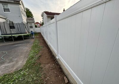 Vinyl fence by Fence Imperial, showcasing a sleek and modern design with low-maintenance features for a contemporary look.