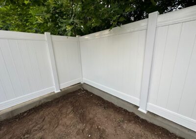 Vinyl fence by Fence Imperial, showcasing a sleek and modern design with low-maintenance features for a contemporary look.