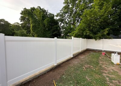 Vinyl fence by Fence Imperial, showcasing a sleek and modern design with low-maintenance features for a contemporary look.