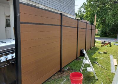 Vinyl fence by Fence Imperial, showcasing a sleek and modern design with low-maintenance features for a contemporary look.