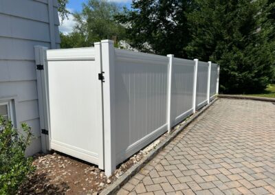 Vinyl fence by Fence Imperial, showcasing a sleek and modern design with low-maintenance features for a contemporary look.