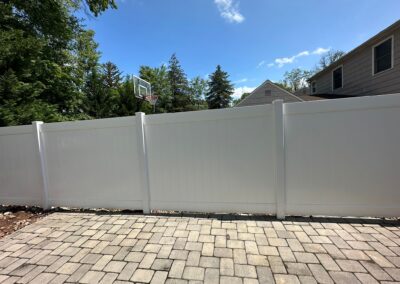 Vinyl fence by Fence Imperial, showcasing a sleek and modern design with low-maintenance features for a contemporary look.