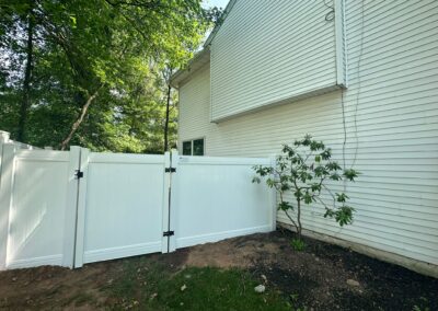 Vinyl fence by Fence Imperial, showcasing a sleek and modern design with low-maintenance features for a contemporary look.