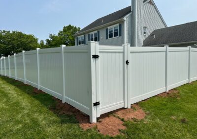 Vinyl fence by Fence Imperial, showcasing a sleek and modern design with low-maintenance features for a contemporary look.