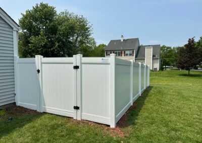 Vinyl fence by Fence Imperial, showcasing a sleek and modern design with low-maintenance features for a contemporary look.