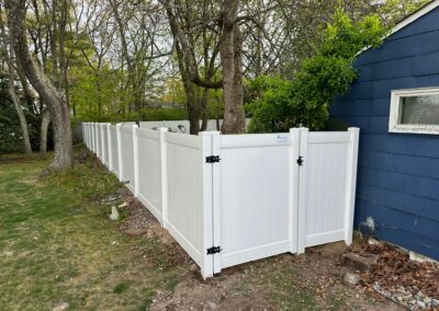 Vinyl fence by Fence Imperial, showcasing a sleek and modern design with low-maintenance features for a contemporary look.