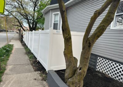 Vinyl fence by Fence Imperial, showcasing a sleek and modern design with low-maintenance features for a contemporary look.