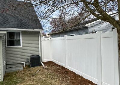 Vinyl fence by Fence Imperial, showcasing a sleek and modern design with low-maintenance features for a contemporary look.