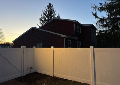 Vinyl fence by Fence Imperial, showcasing a sleek and modern design with low-maintenance features for a contemporary look.